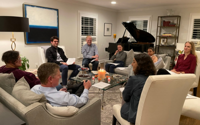 Residents and faculty members participate in a Journal Club meet-up for residents in the Duke Psychotherapy Track (DPT), where they discuss articles about psychotherapy and engage in informal conversations about career development.
