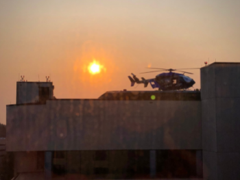 A morning view of the helicopter pad and sunrise taken from the 8th floor of Duke Hospital.