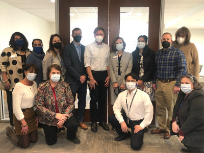 Members of Duke Psychiatry & Behavioral Sciences pause for a photo before the ribbon-cutting event on March 1, 2022.