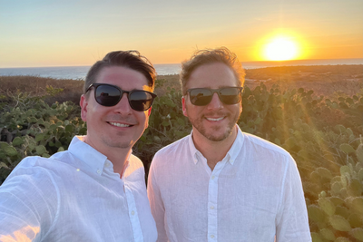 Cameron & Zach enjoying a sunset in Aruba