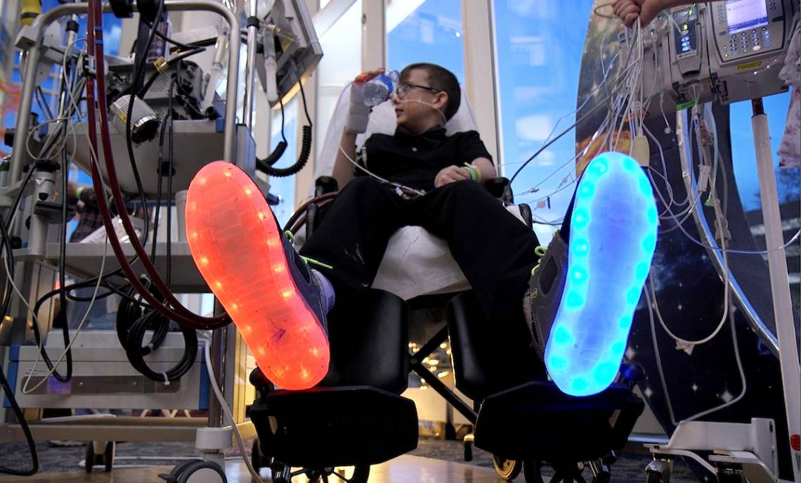 James Fowler and his cool light-up dance shoes at Duke Children's prom on April 14. Photo by Shawn Rocco