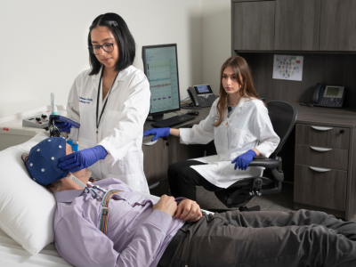 Duke Psychiatry staff members perform an EEG simulation.