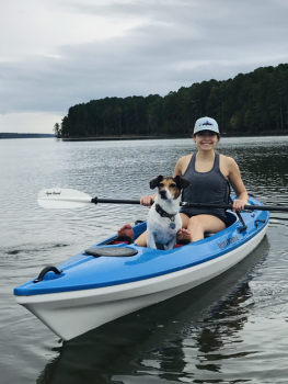 Sarah Eckstein kayaking with her dog