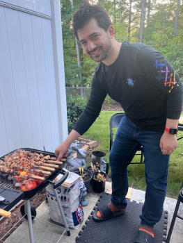Co-fellow Hussein Bayazit grilling kebabs