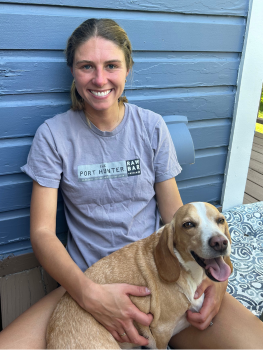 Dr. Thibodeau hanging out with her dog