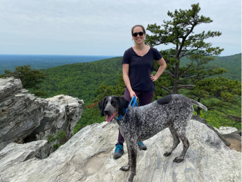 Chloe Bolon hiking with her dog