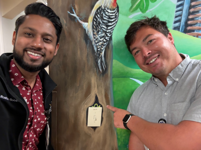 Dr. Brody Montoya, right, and Roshan Boodram, MD, participating in the CAP fellowship scavenger hunt during orientation.
