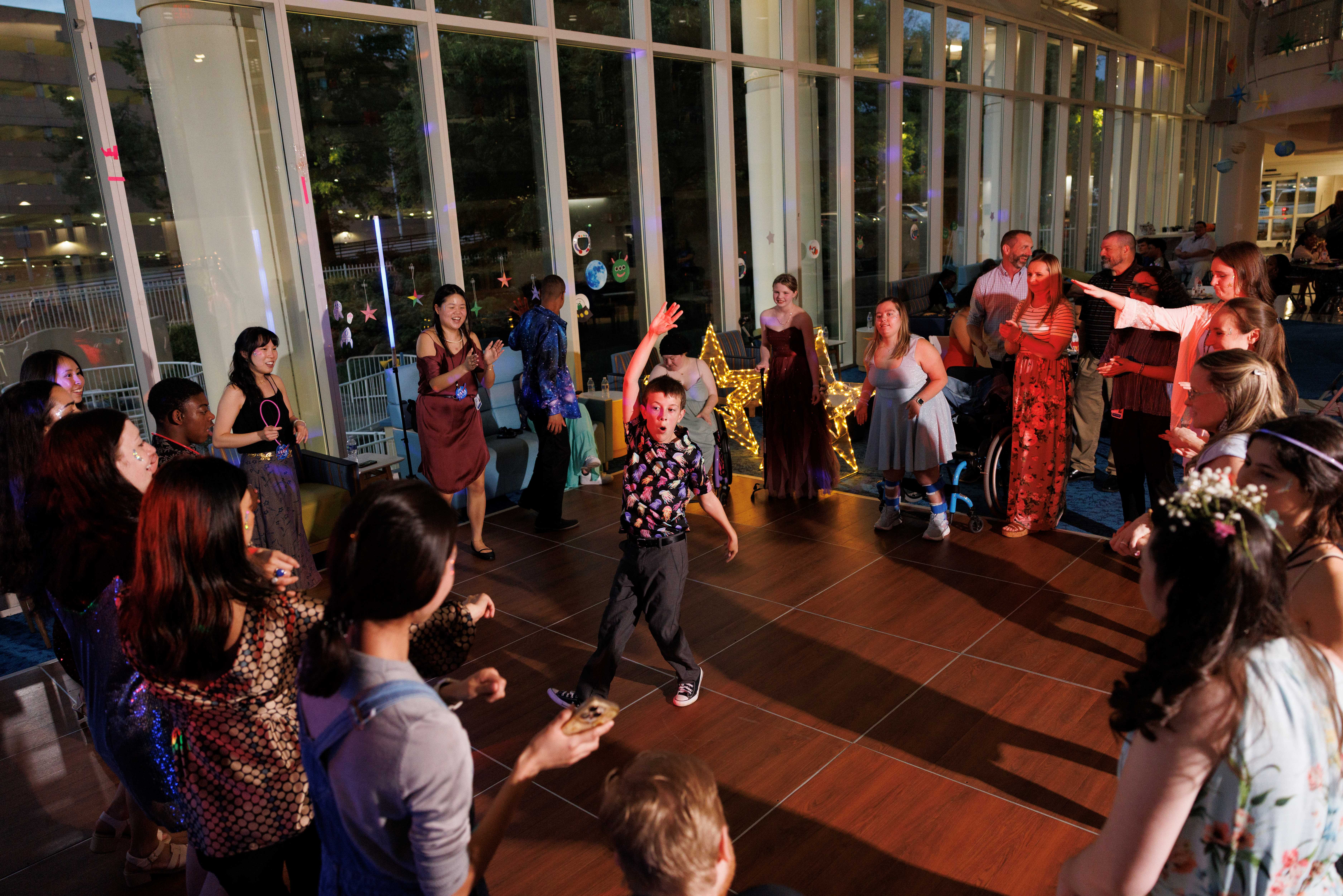 Child dancing on dance floor in the Children's Hospital Lobby