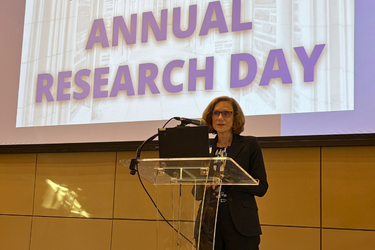 Department chair Moira Rynn, MD, makes opening remarks at a research retreat