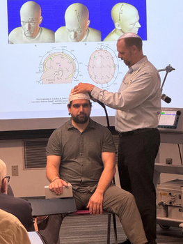Greg Sahlem, PhD & Bobby Charalambous, PhD, demonstrate TMS in one of the 2026 courses.