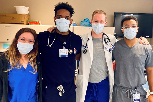 Kathryn Clary (left) and peers in clinic