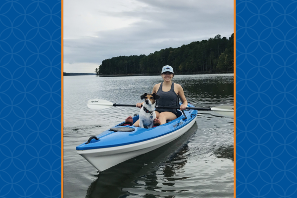 Sarah Eckstein kayaking with her dog