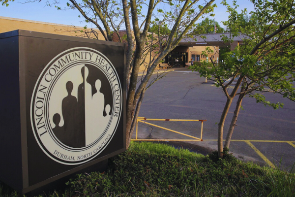 Lincoln Community Health Center sign with center in background