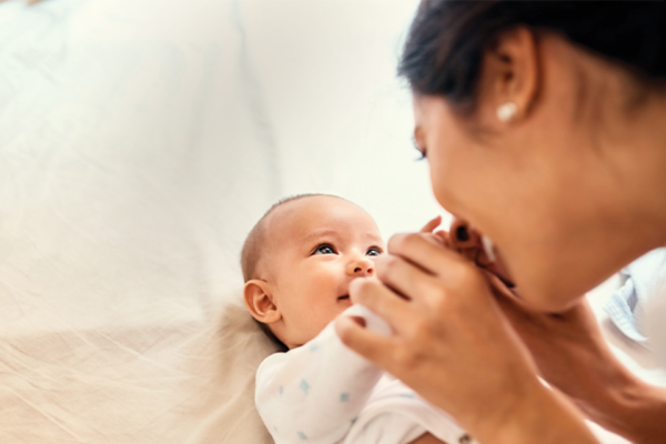 Mom playing with baby