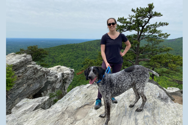 Chloe Bolon hiking with her dog