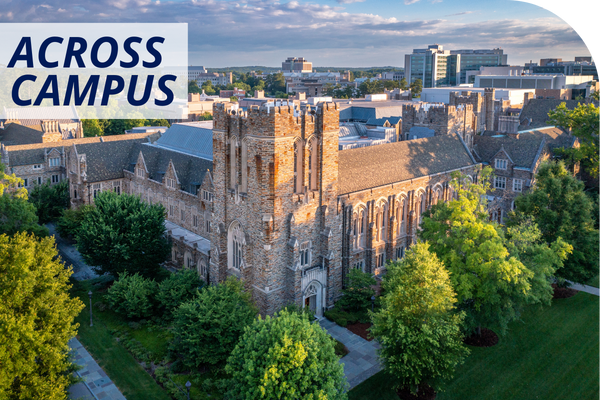 Aerial of Duke University campus at sunrise with lush green trees