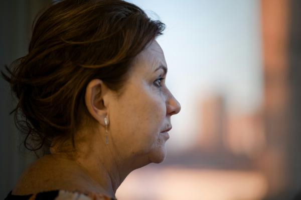 Sad Woman Looking Out Window