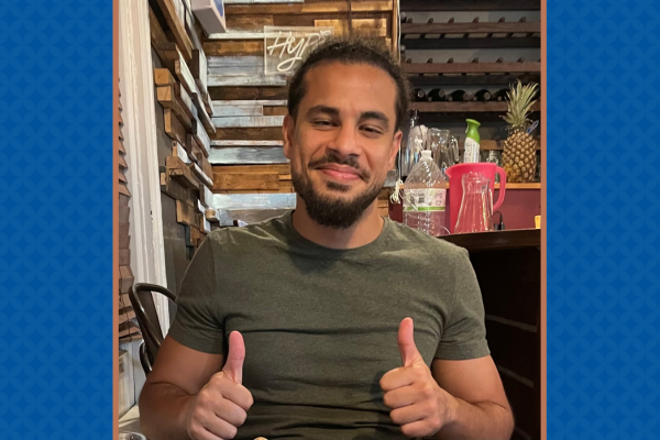 Rooma Elnasseh with two thumbs up