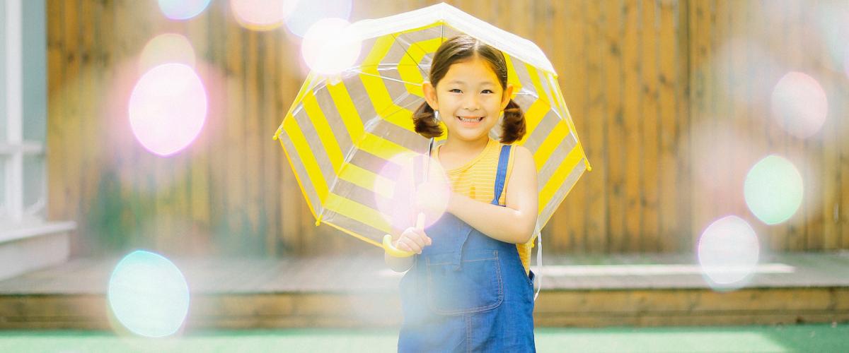 Little girl with umbrella