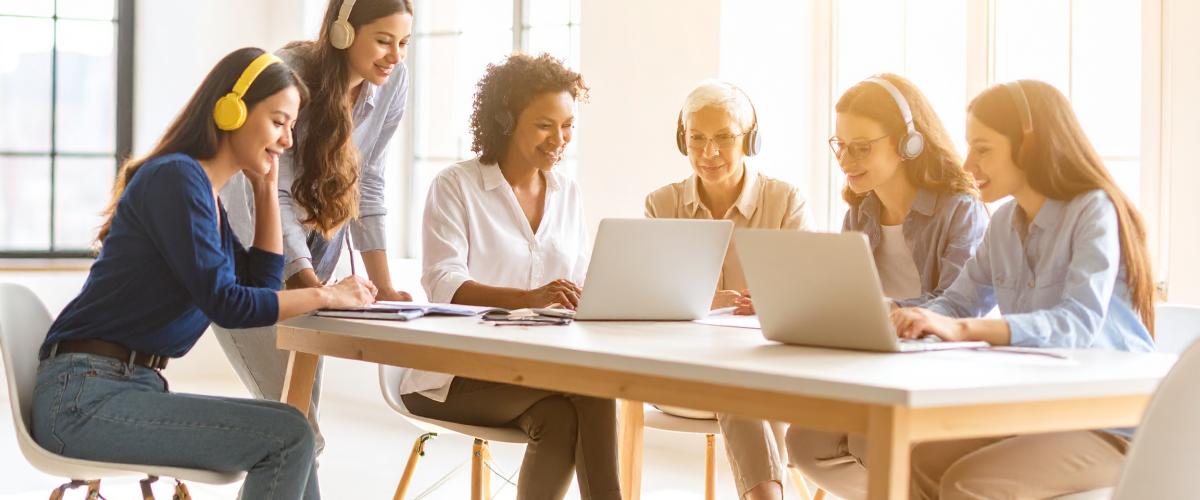 group of young and older women researching
