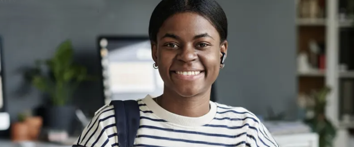 Young Black female smiling