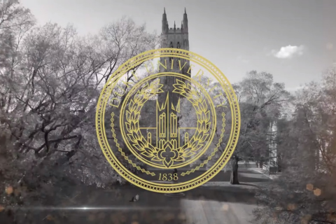Presidential Awards Ceremony Video Screen Shot - Black and White Image of Duke Chapel with Yellow Seal Superimposed
