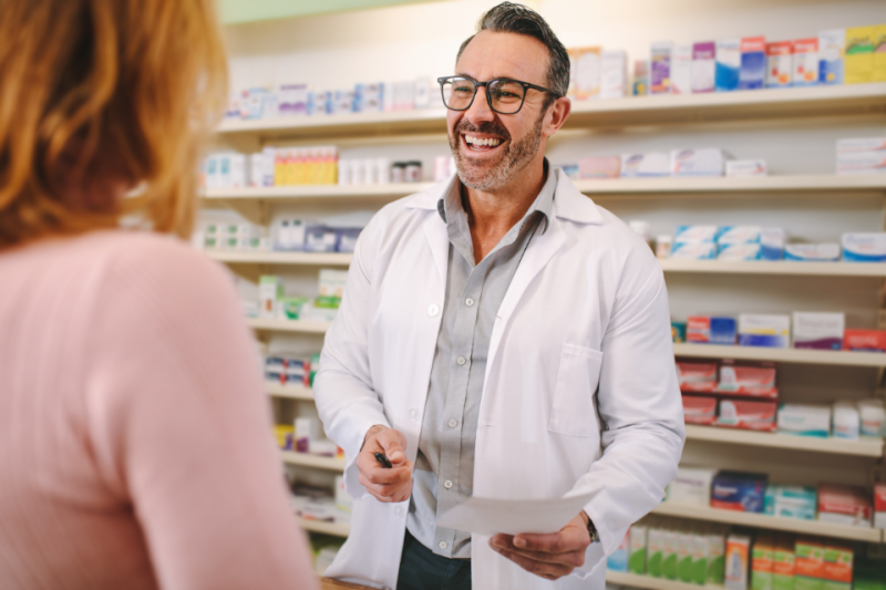 Pharmacist assisting a customer