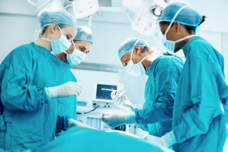 Stock photo: Neurosurgeons conducting brain surgery