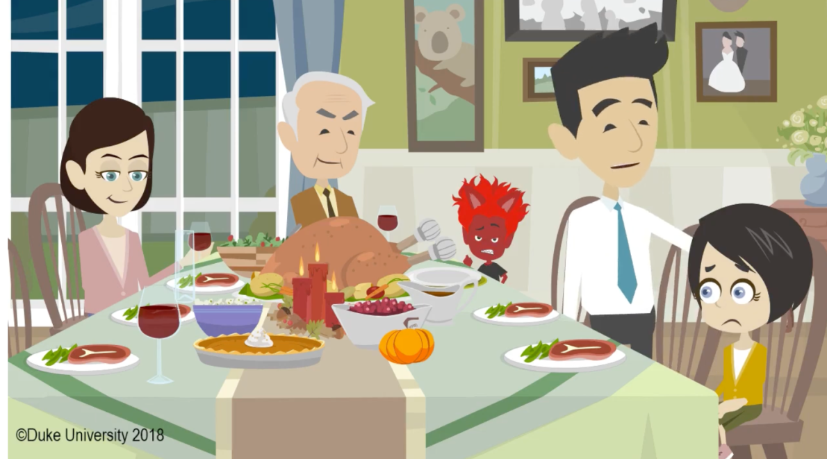 Family sitting at a dinner table. Boy has an uncomfortable expression on his face.