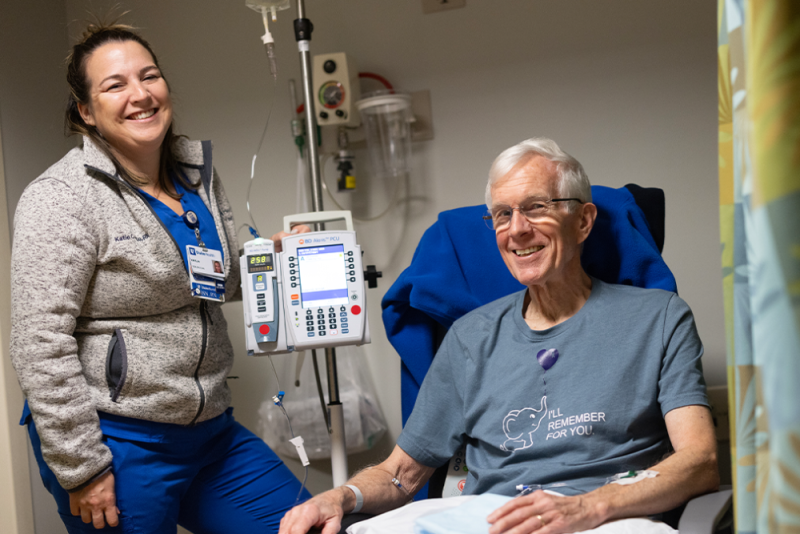 Steve Smith receives an infusion of a new medication to treat Alzheimer’s from Kaitlin Gingue, BSN, RN, CNII, at Duke Health’s Specialty Infusion Clinic.