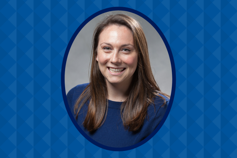 Caroline Dorfman in oval shaped frame; blue background