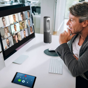 Man participating in Zoom meeting