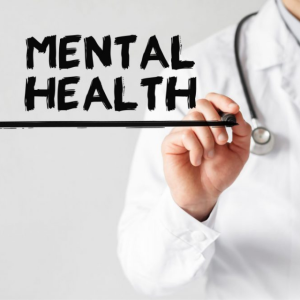Words "Mental Health" with clinician standing behind words
