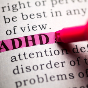 The acronym "ADHD" highlighted on a page describing ADHD.
