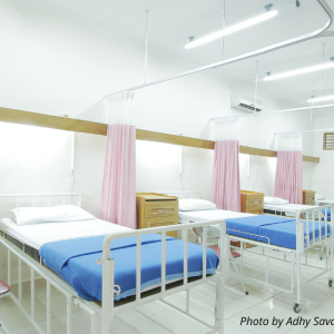 Three empty beds in an emergency department. Photo by Adhy Savala on Unsplash.  