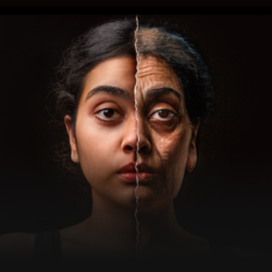 Black background; woman's face with right side of face looking younger and left side of face looking older.