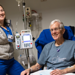 Steve Smith receives an infusion of a new medication to treat Alzheimer’s from Kaitlin Gingue, BSN, RN, CNII, at Duke Health’s Specialty Infusion Clinic.