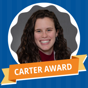 Emily Aarons in medallion style photo frame. Orange ribbon reading "Carter Award." Blue striped background.