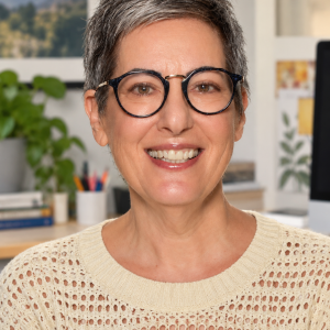 Lisa Witler with glasses and a smile